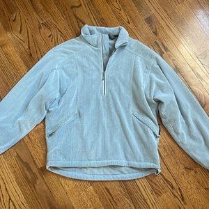 sunice quarter zip with adjustable bottom and two front pockets
